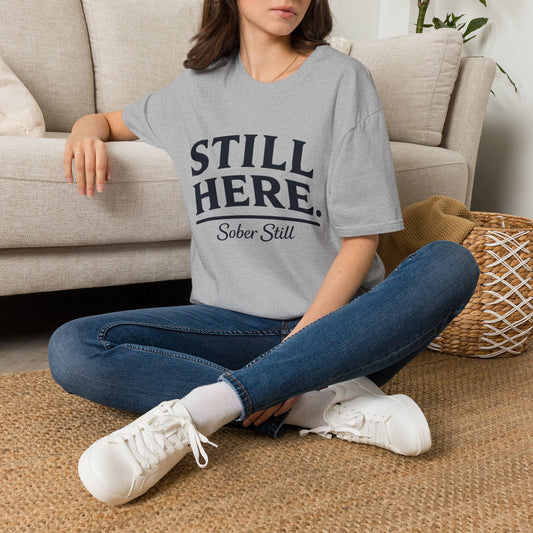 Still Here T-Shirt by Sober Still, front view with STILL HERE. printed across the chest