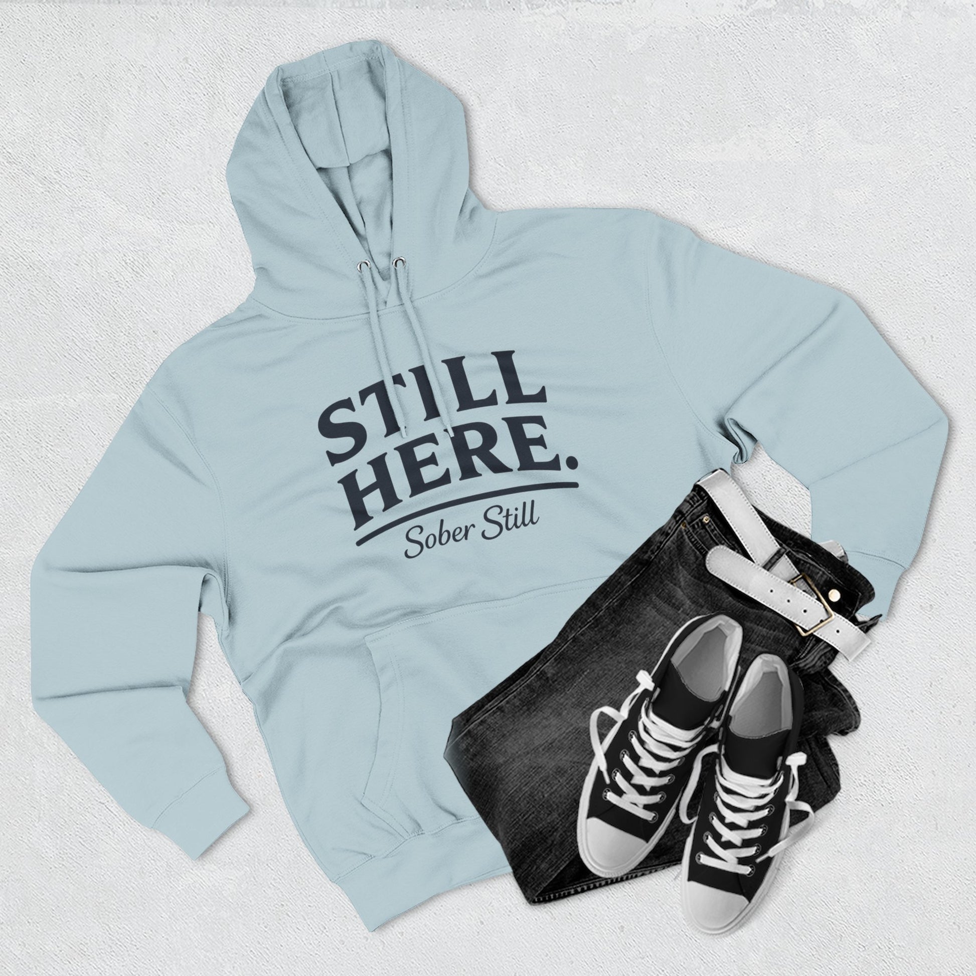 "Still Here." hoodie by Sober Still, size chart graphic