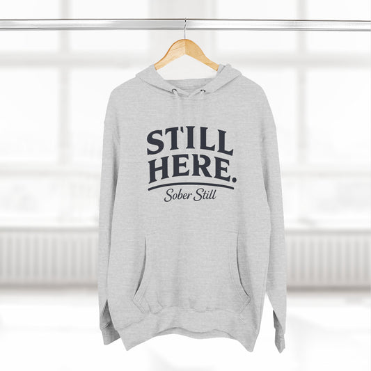 "Still Here." hoodie by Sober Still, front view